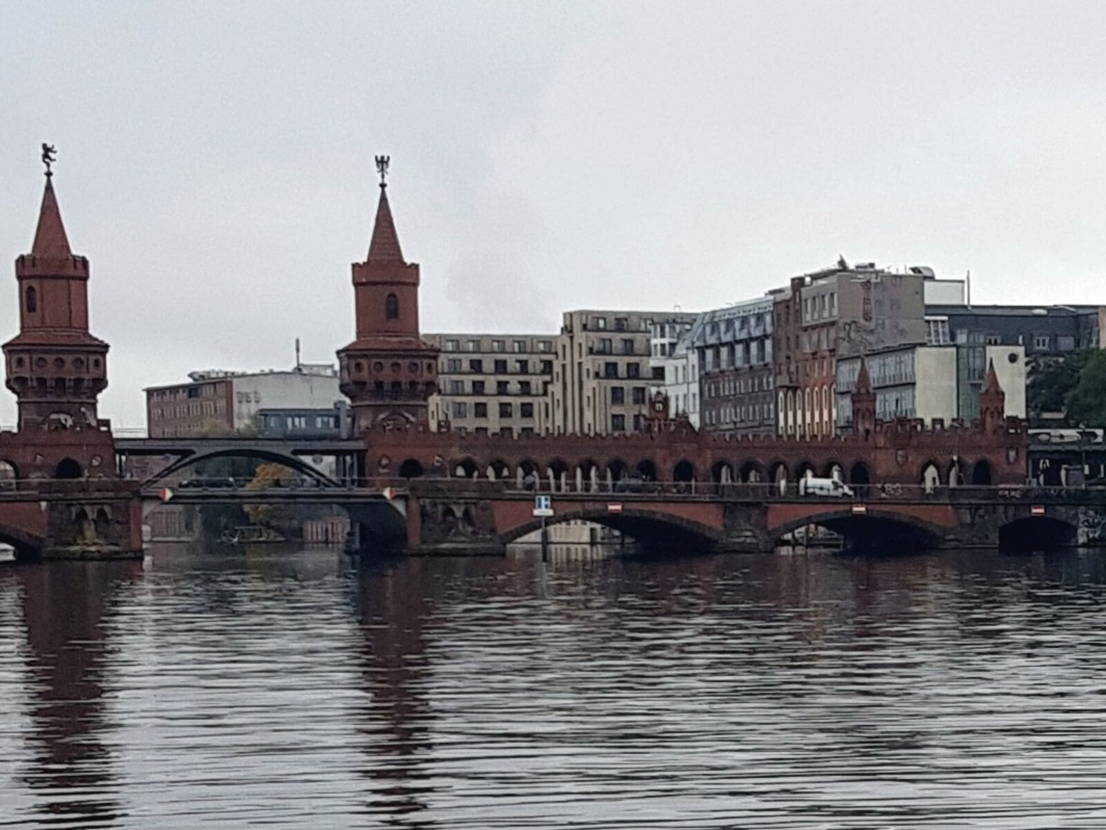 Follow this tour in East Berlin and along the Spree River. Parks (G&ouml;rlitzer, Treptower and soviet Memorial), and river banks, iconic bridge, and the famous outdoor East Side Gallery paintings on…